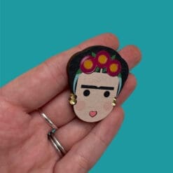 Acrylic and wood statement brooch inspired by Frida K