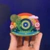 Rainbow Snail - colourful wooden desk accessory